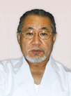 理事長 新冨芳尚 先生